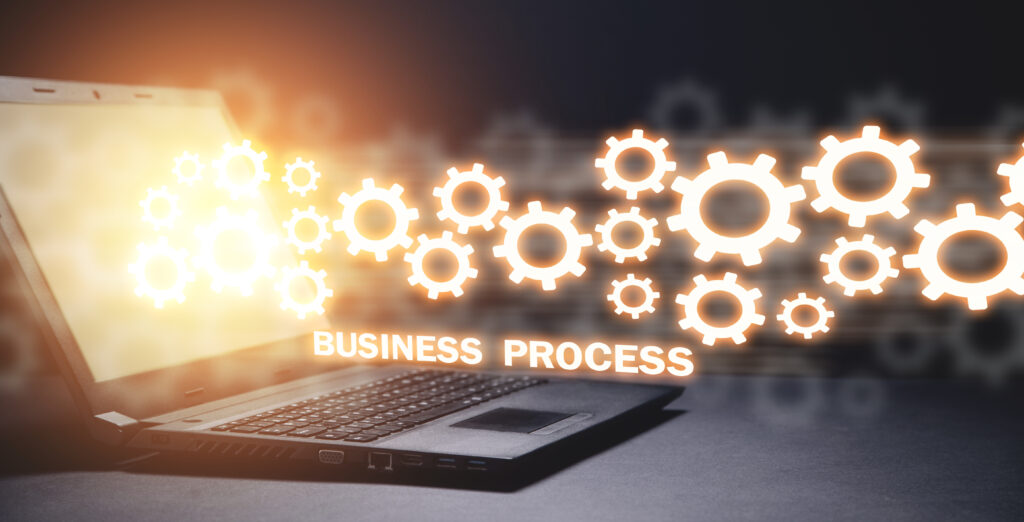 Laptop with a gears. Business Process